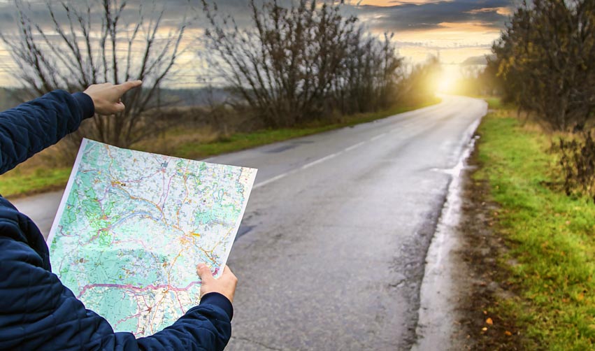 Person-holding-a-map-and-finding-a-clear-route-forward-beyonderptech